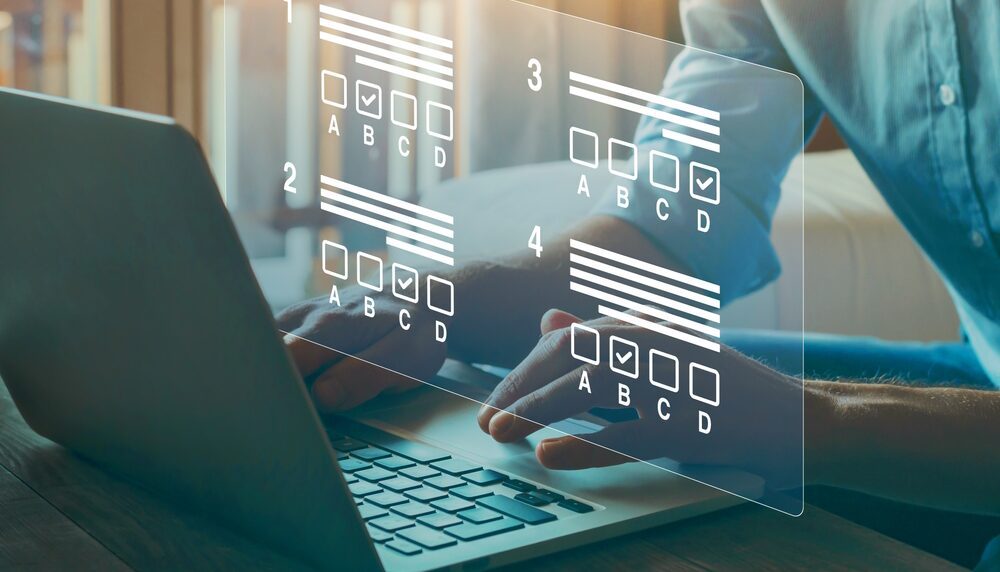 A person is typing on a laptop with multiple options.