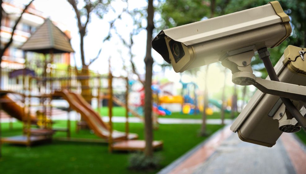 A view of a playground with a camera on the side.